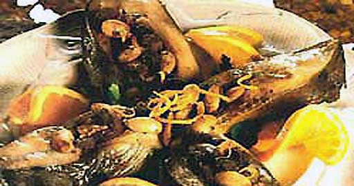 Карп запеченный в сметане с грибами фотография